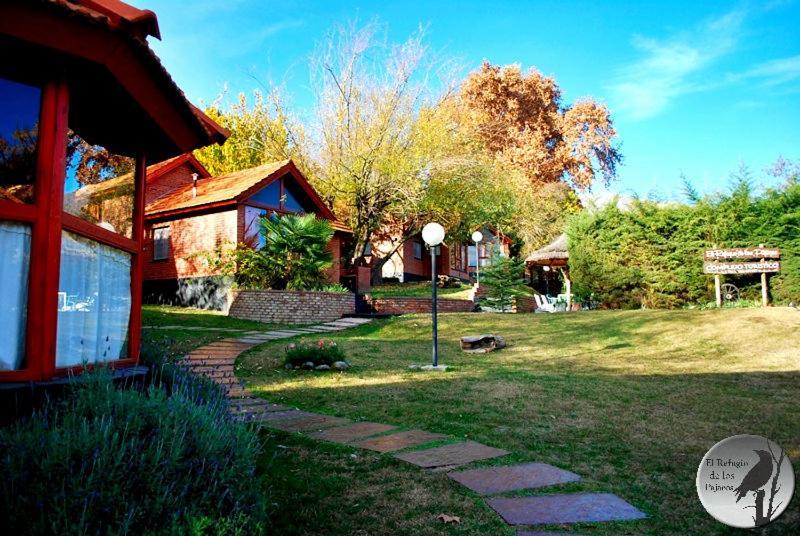 Cabanas El Refugio De Los Pajaros Merlo Exteriör bild