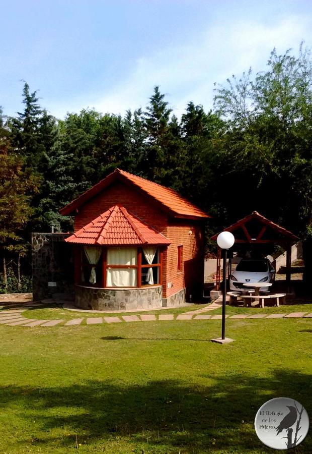 Cabanas El Refugio De Los Pajaros Merlo Exteriör bild